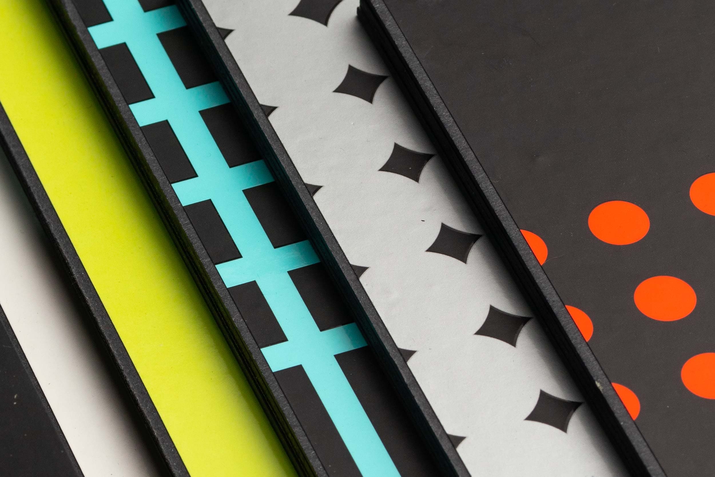 Handcrafted lamination of spotcolor printed titles