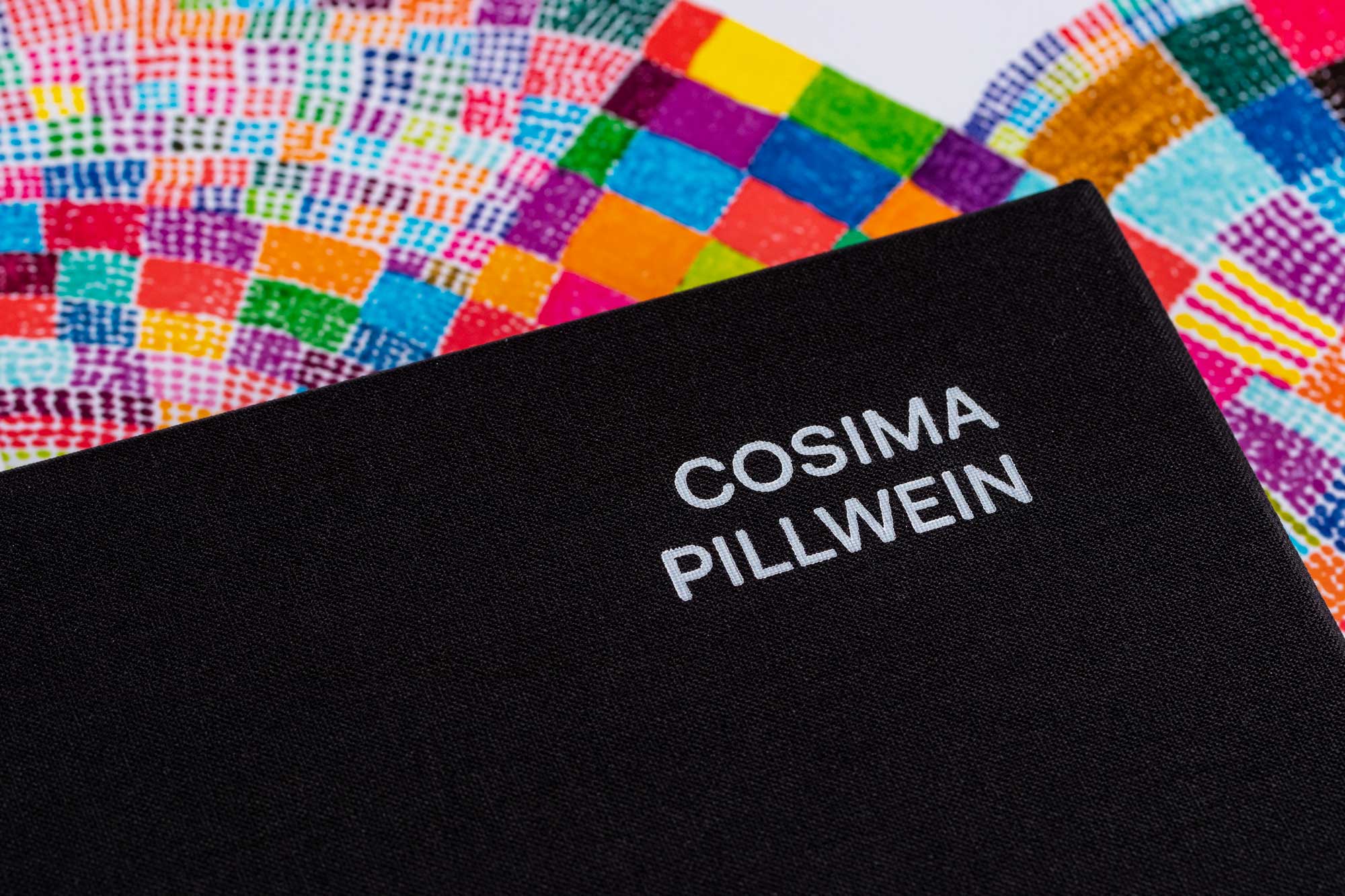 Embossing on the lid of the canvas covered box